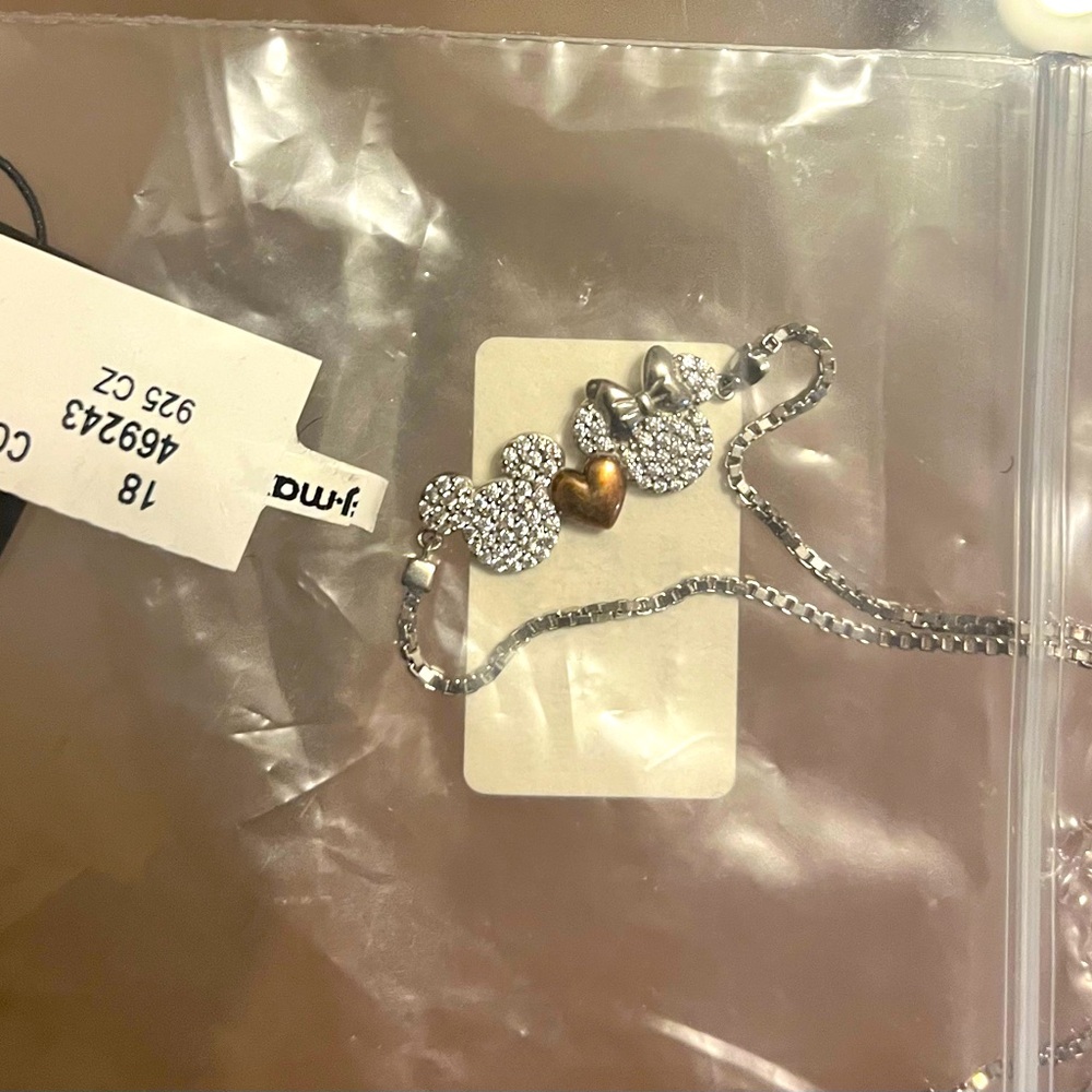Brand new Mickey and Minnie sterling silver adjustable bracelet